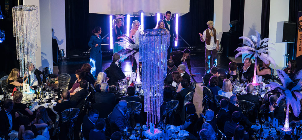 Las Vegas Themed Celebration gala dinner celebrate crystal chandelier black and white modern contemporary