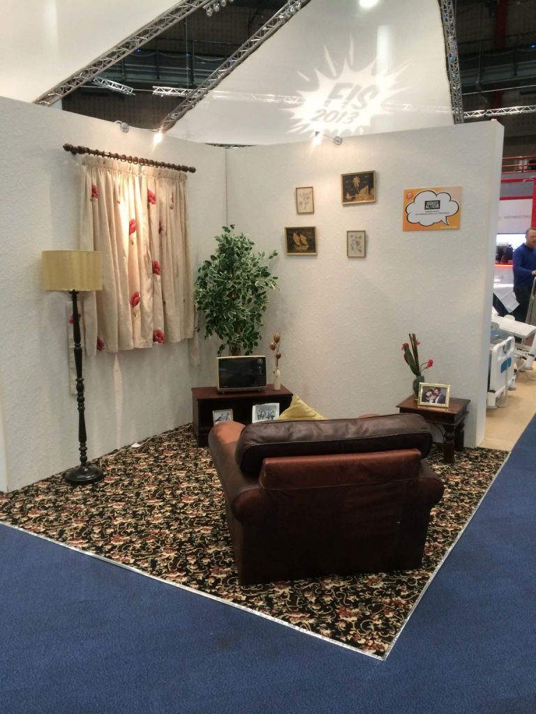 exhibition stand living room installation chairs sofa vintage living area