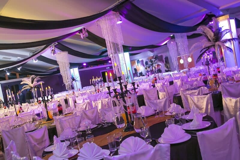 Great Gatsby Theme black and white table centres black and white ceiling draping vibes themes candle s