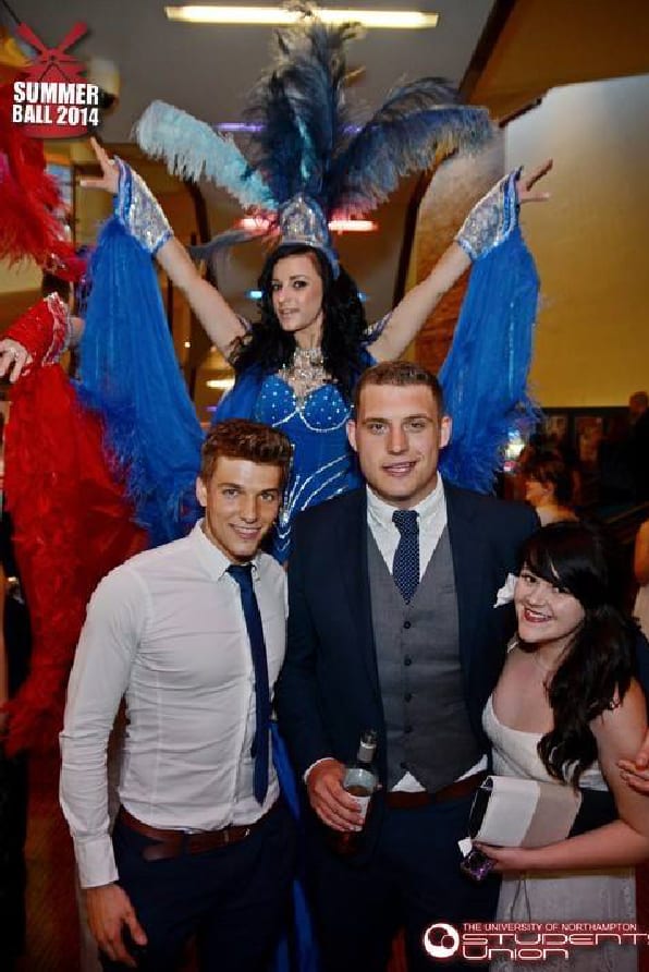 Graduation Party with dancer in blue outfit in background