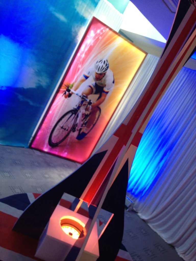 Sports Theme light boxes table centres white wall draping room styling room decor props hire