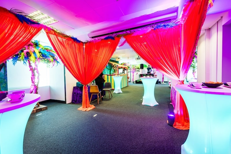 Tropical Beach Theme room venue dressing draped curtains