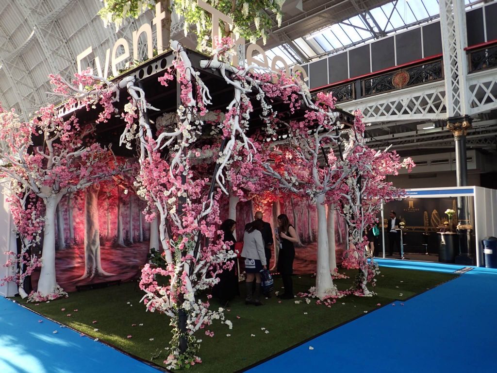 White tree with pink cherry blossom flowers creating an orchard with white cherry blossom wall mural