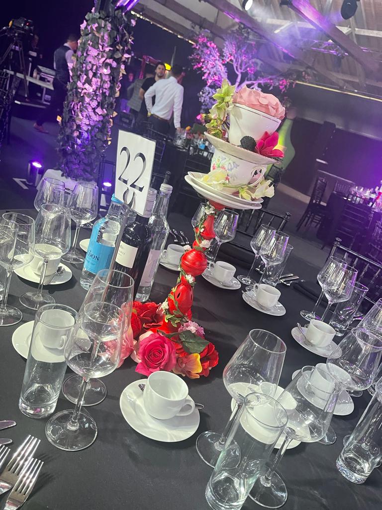Alice in wonderland mad hatter colourful teacup table centre
